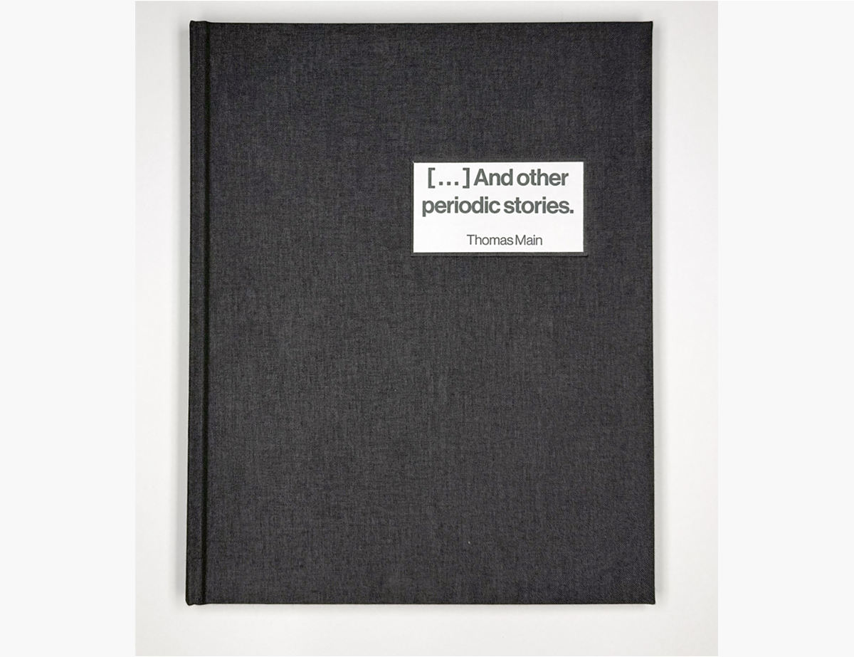 Photograph of flowers in a book with text